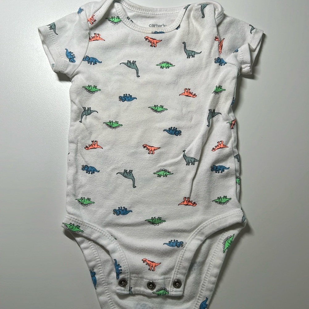 3 for $9 
Like new Carters short sleeve onesie, white with Dino print, size 6M